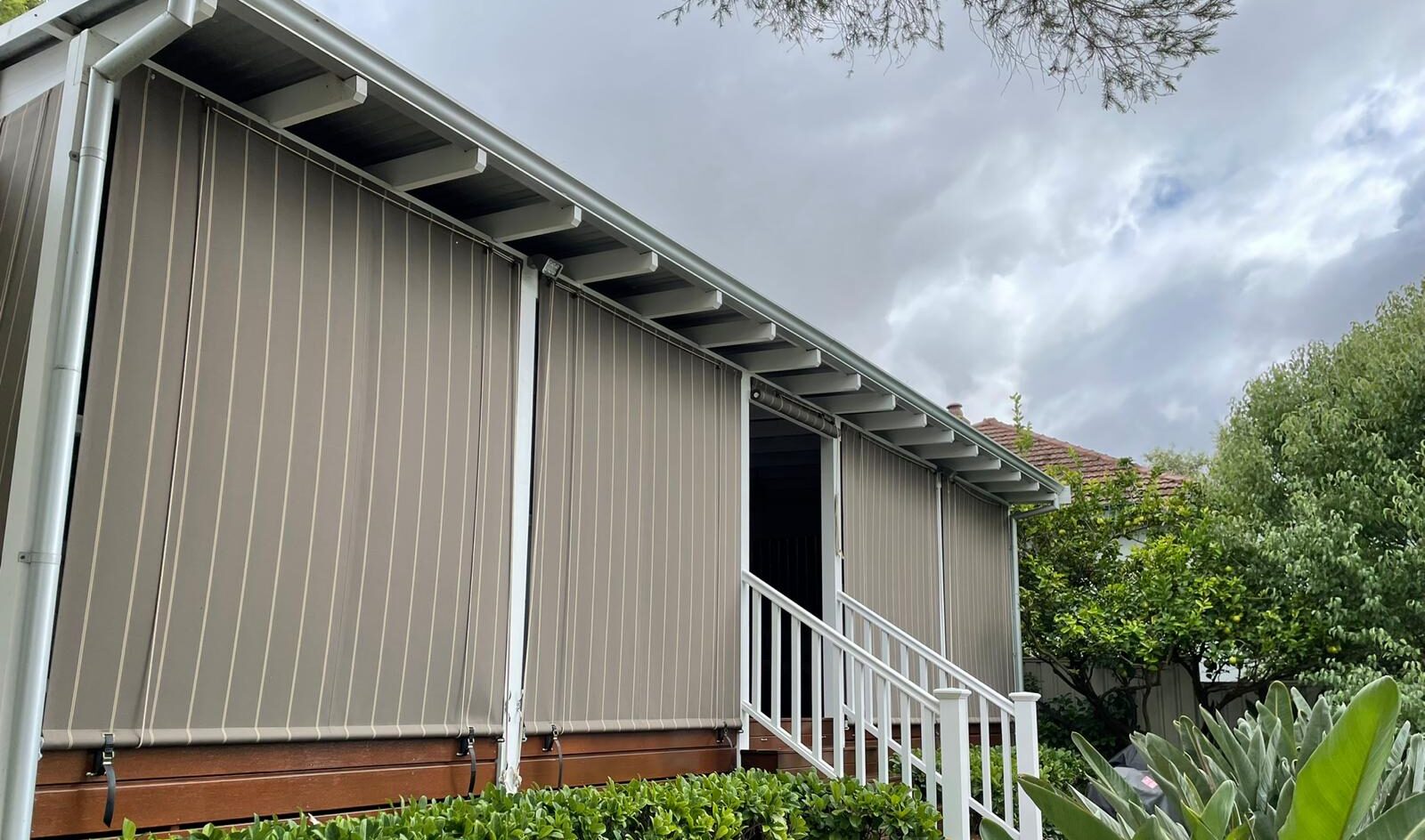Outside verandah with mesh outdoor blinds from Kenlow, Western Australia